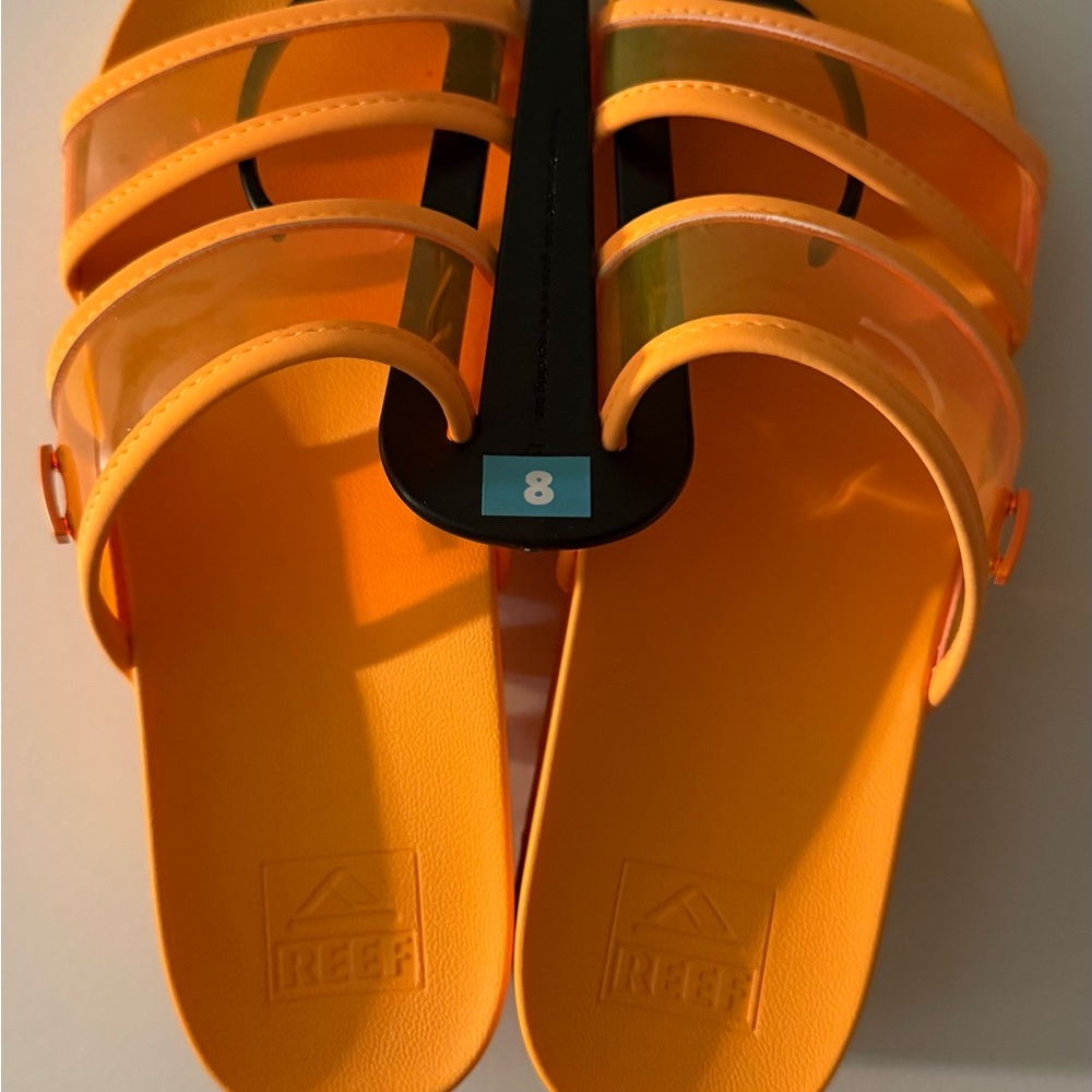 Reef Women’s Size 8 neon orange sandal slides.